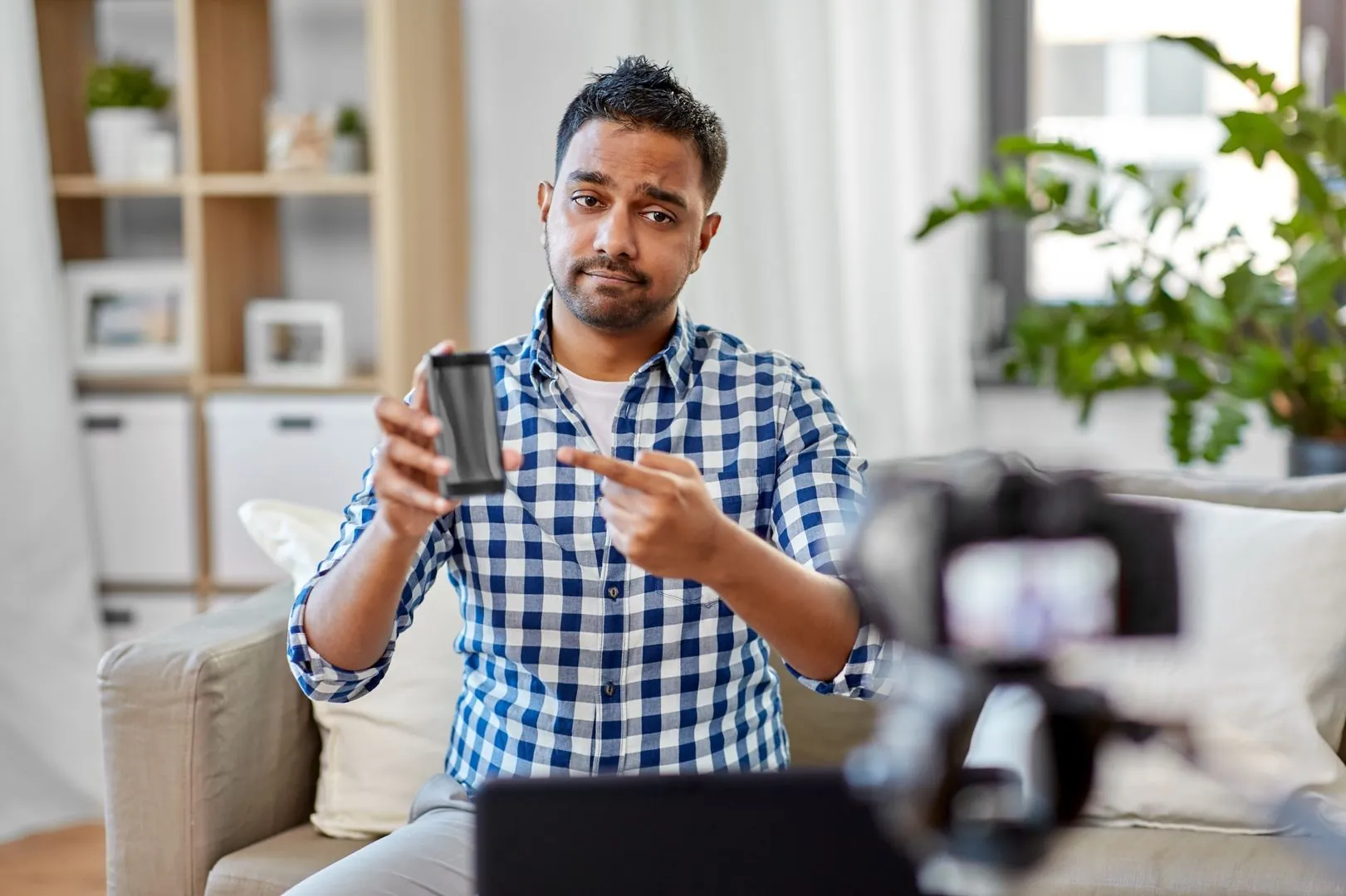 Content creator filming on phone gimbal